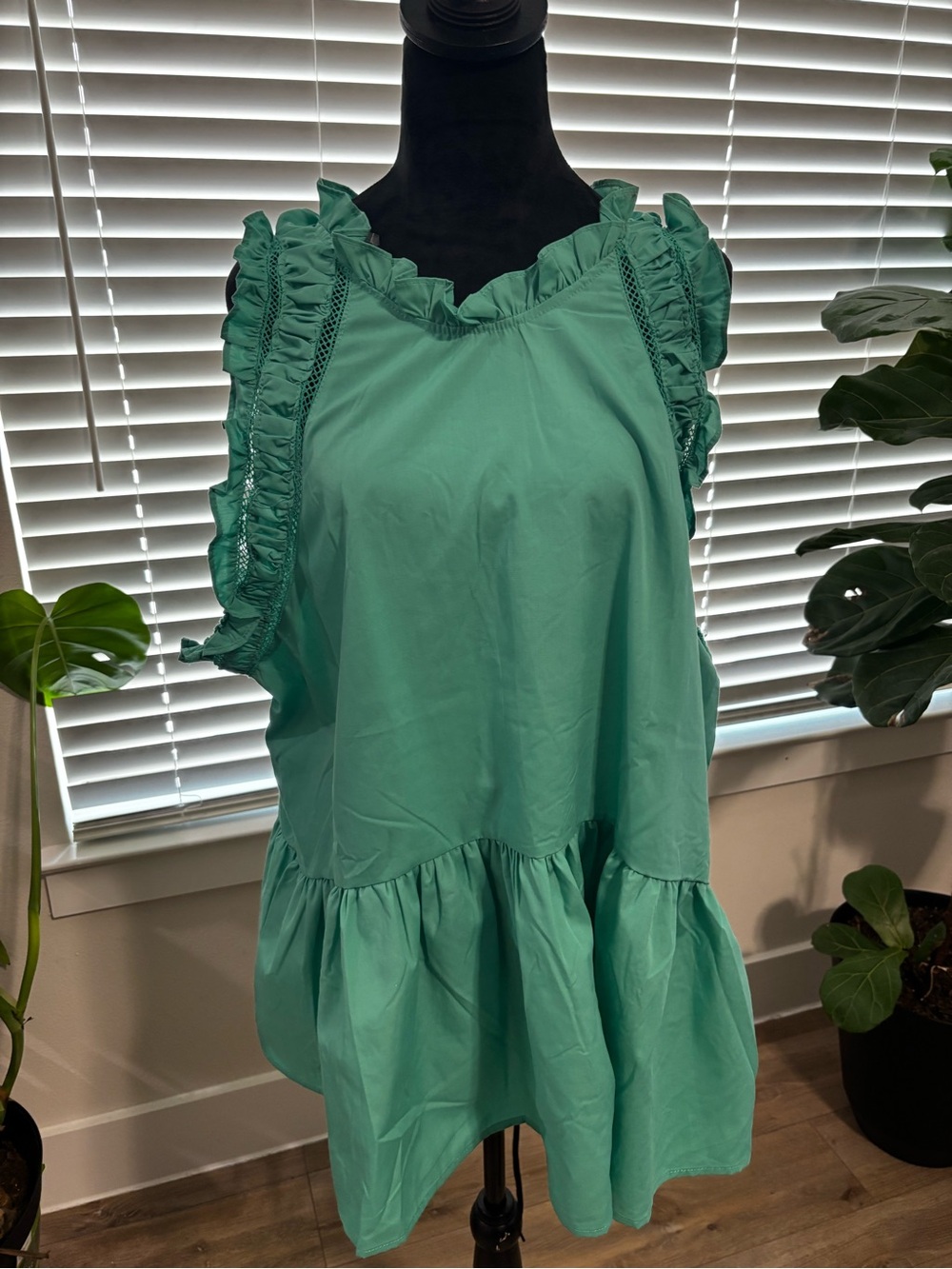 Sleeveless Ruffle-Trim Peplum Tunic in Teal